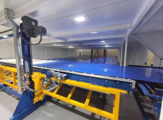 Transportador de paletas y skids para piezas industriales pesadas